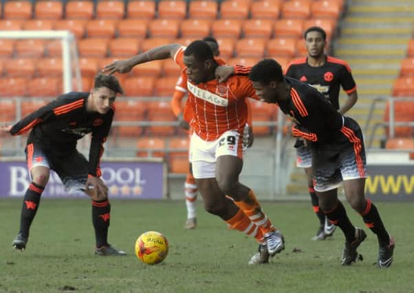 Uche Ikpeazu in action for Blackpool's reserves against Manchester United