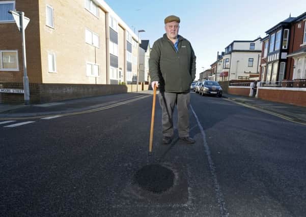 Terry Capp says the state of the road outside his home is causing reverberations and cracks
