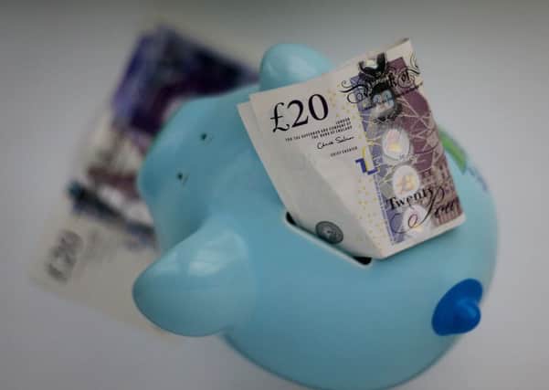 Embargoed to 0001 Monday February 29

File photo dated 06/01/15 of money in a piggy bank, as not saving enough cash, having a paltry pension pot and getting into debt are Britons' biggest financial regrets, research has found. PRESS ASSOCIATION Photo. Issue date: Monday February 29, 2016. Being unable to work or earn more in their job, delaying buying a house, taking bad advice from family or friends and getting divorced were other common money mistakes. See PA story MONEY Regrets. Photo credit should read: Gareth Fuller/PA Wire