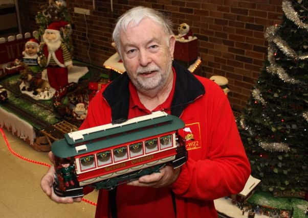 G-Wizz organiser Allan Judd with a Festive Santa Express display