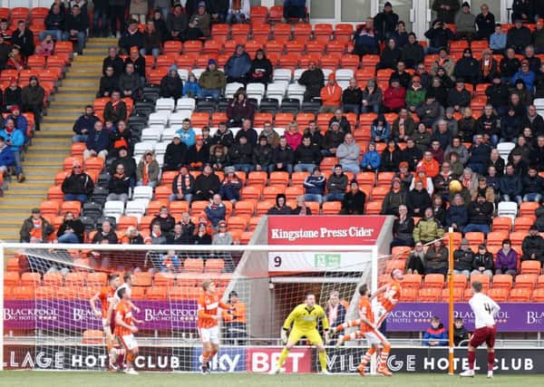 Plenty of home supporters seats empty as Blackpool fans watch the first half  last weekend