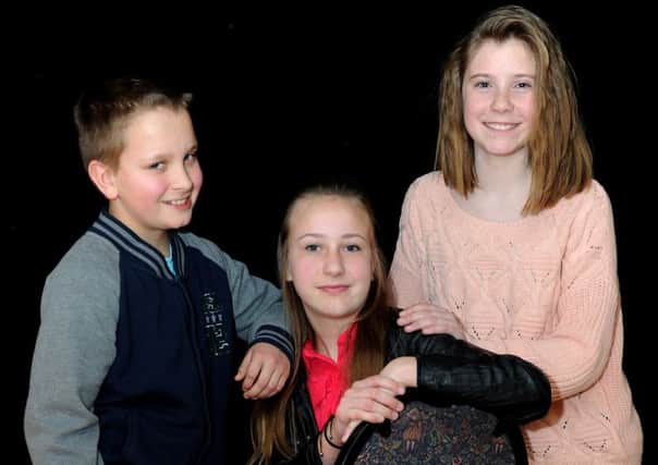 The Fleetwood Carnival Queen and retinue were chosen at the towns' Working Mens Club on Sunday. The new Queen elect is Charlotte Kennedy aged 13. Charlotte is seen here seated with page boy Jacob Kennedy aged 10 and Prince Charming Lucy Chantler aged 13. Picture by Paul Heyes, Sunday February 28, 2016.