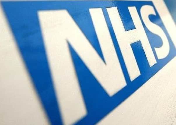 NHS logo.