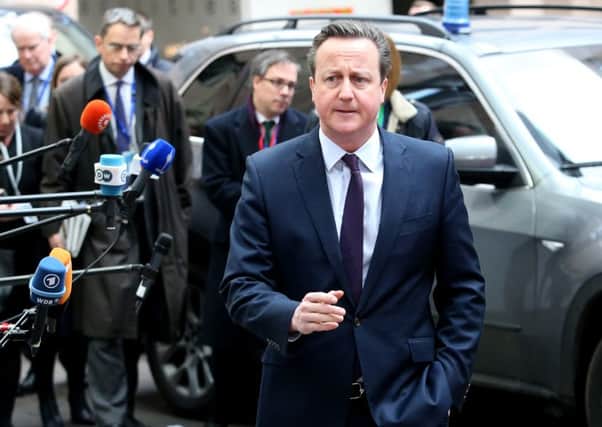 British Prime Minister David Cameron arrives for an EU summit at the EU Council building in Brussels on Monday, March 7, 2016. European Union leaders arrived in Brussels Monday to press Turkey to do more to stop migrants entering Europe and to shore up support for Greece, where thousands of people are stranded. (AP Photo/Francois Walschaerts)