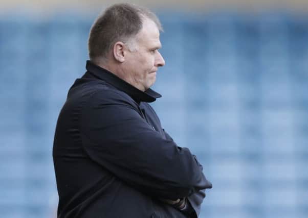 Blackpool manager Neil McDonald looks on during Saturday's defeat at Millwall