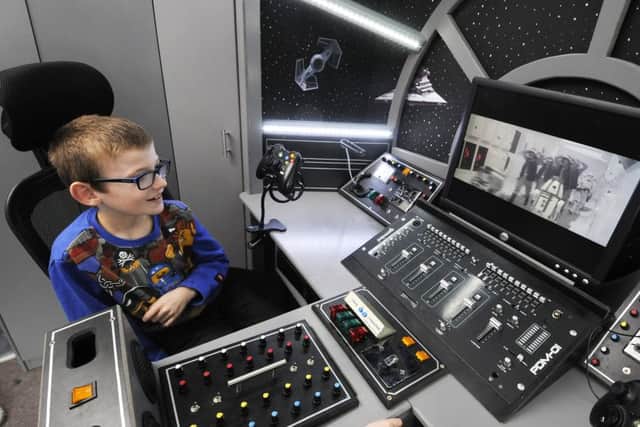 Dad Dave Bonney had built a Millennium Falcon entertainment centre in the bedroom of his two sons George, 8 and Dylan, 9.