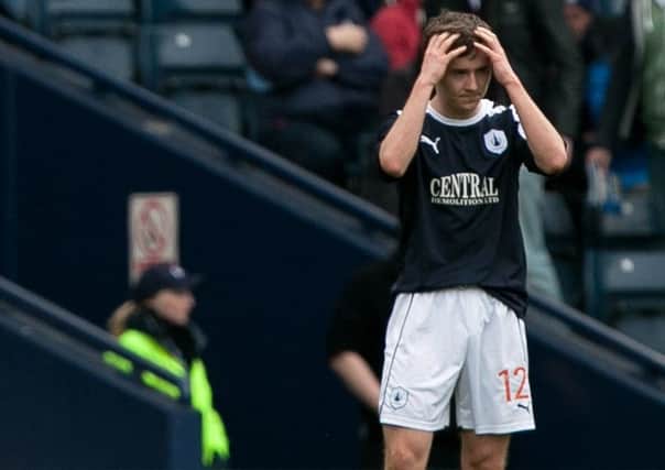 Thomas Grant (right) is hoping for happier times at Town after playing for Falkirk in this Scottish Cup semi-final defeat by Hibernian at Hampden Park in 2013. Photo credit: Chris Clark/PA Wire.