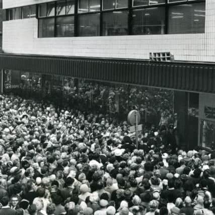 A big crowd gathered in Banks Hey Street today for the opening of the new R.H.O Hills store. 1968