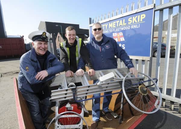 Liam Barnes from Foulds Metals Ltd with Cpt David Eccles, right, and second coxswain Tony