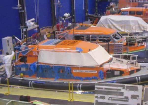 Fleetwood's new Shannon-class lifeboat takes shape in the RNLI boatyard at Poole, Dorset.