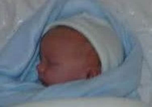 Little Freddie Neil, who died aged just four weeks old