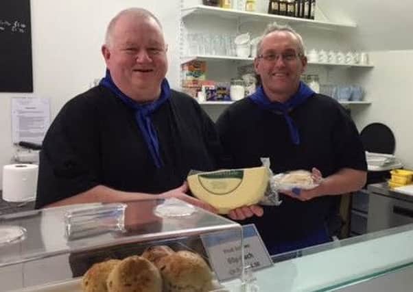 Robert Brown (right) with one of his customers at the new Skye's Deli at Fleetwood Market