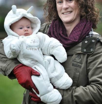 Picture by Julian Brown 12/03/16


Louise Holt pictured with the youngest walker, Bronwyn Shannon aged 15 weeks at the Walk For The Library event which set off from St Annes Library, St Annes.