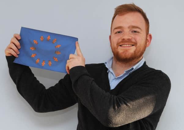 Blackpool councillor Luke Tayloe has launched his campaign group 'Gingers for EU' which is campaigning against Brexit. Luke with his ginger-themed EU flag.