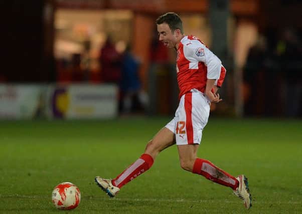 Debutant Thomas Grant in action against Walsall. Photographer Dave Howarth/CameraSport