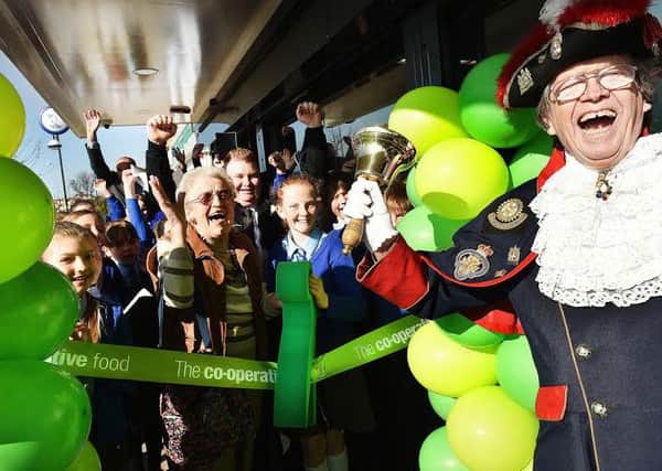 Co-op opening Normoss Blackpool: Blackpools town crier Barry McQueen and pupils from Staining Primary School