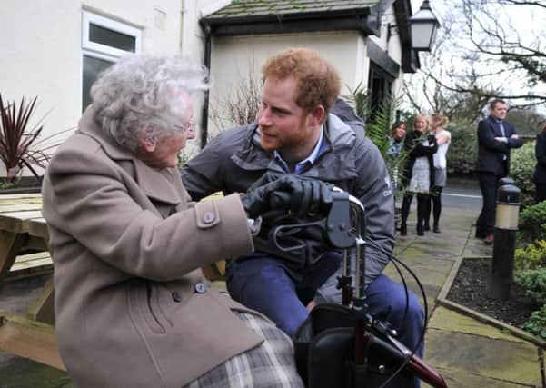 Prince Harry in St Michaels  after the floods