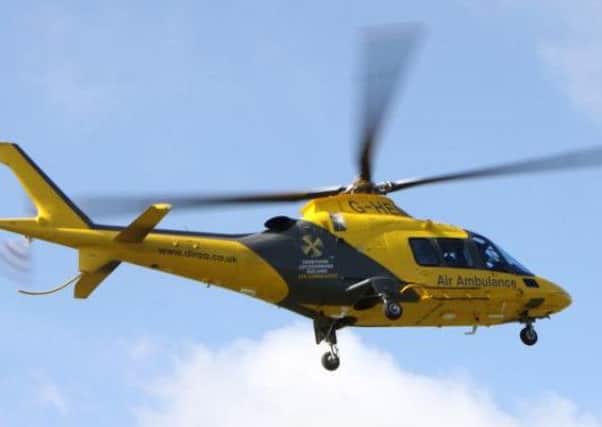 An Air Ambulance was called to the scene of a crash today after a woman sustained a neck injury.