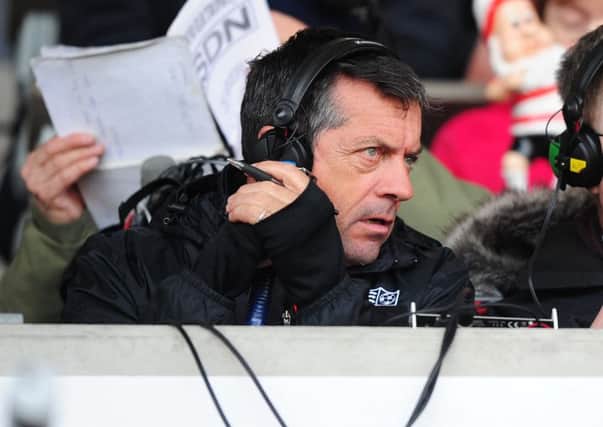 Southend United manager Phil Brown working for BBC 5Live at Blackpool's game on Monday