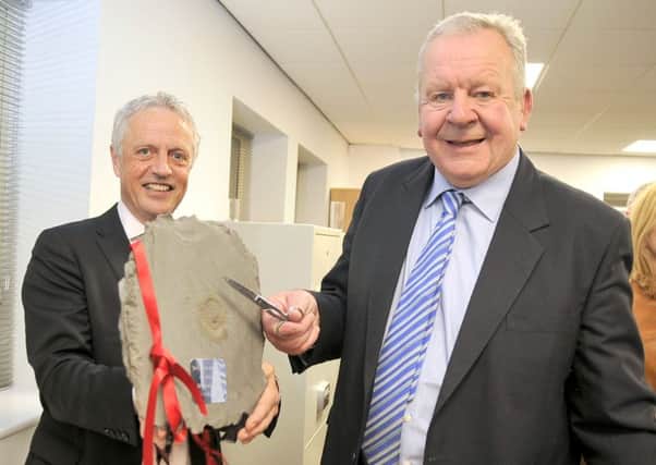 LAUNCH CEREMONY: Bill Beaumont, right, and Francis Egan at the office opening