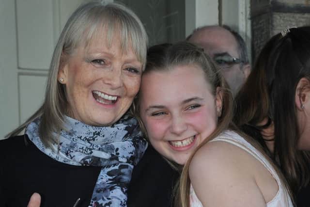 The North Euston Hotel in Fleetwood celebrated its 175th birthday with a ceremonial re-opening and tea party.
Preparing to cut the ribbon, including (centre) hotel owner Fiona Spearman shares a moment with grand-daughter Brooke Marsden after the ribbon-cutting. PIC BY ROB LOCK
25-3-2016