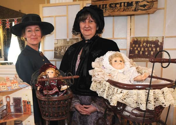 The North Euston Hotel in Fleetwood hosted a classic car show run jointly by Pilling Car Club and Blackpool Vehicle Preservation Club.
Angie Hesketh (left) and Jennifer Ray from Fleetwood Museum with part of their 'pop-up museum' display. PIC BY ROB LOCK
28-3-2016