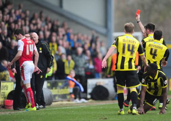 Fleetwood Town's Bobby Grant is shown a red card by Referee Oliver Langford  Photographer Chris Vaughan/CameraSport