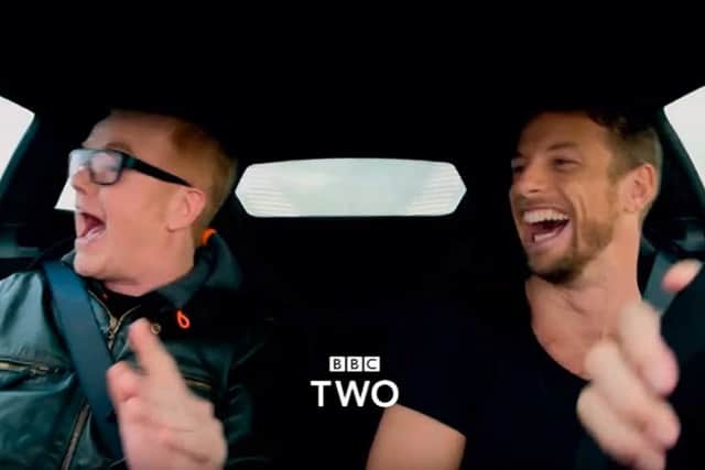 Chris Evans and Jensen Button share a laugh