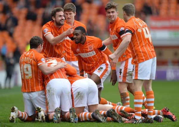 Blackpool players celebrate Mark Cullen's goal