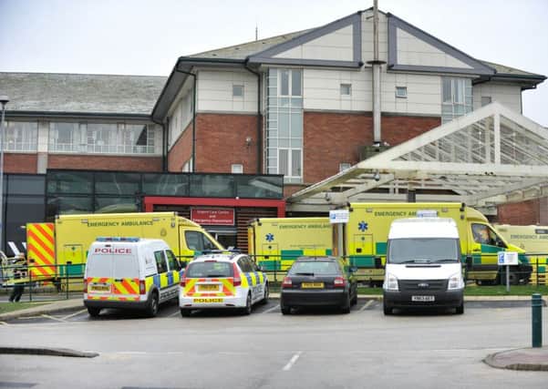 Ambulances wait at Blackpool Vics A&E department.