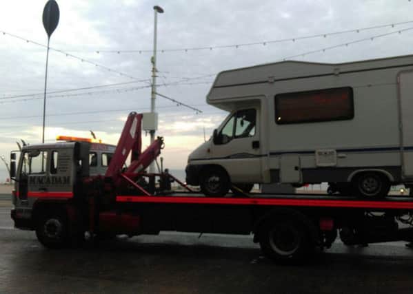 A camper van is towed from outside Blackpool Tower   Picture: Lancashire Police