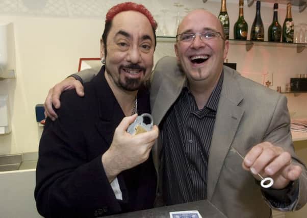 David Gest meets magician Simon Fitzpatrick from Sumu't Tricky during his visit to Septembers in Blackpool