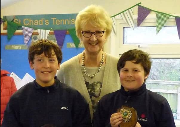 Lawn Tennis Association president Cathie Sabin with Simon and Harry Gordon at St Chad's Tennis Club open day in Poulton.