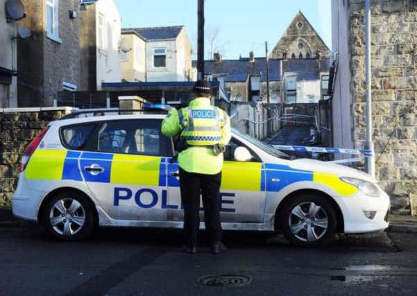 Police at the scene of the shooting in Accrington