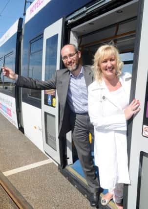 Stay Blackpool have teamed up with eviivo to advertise on Blackpool trams during the summer.  Ian Hardwick from eviivo and Claire Smith from Stay Blackpool.