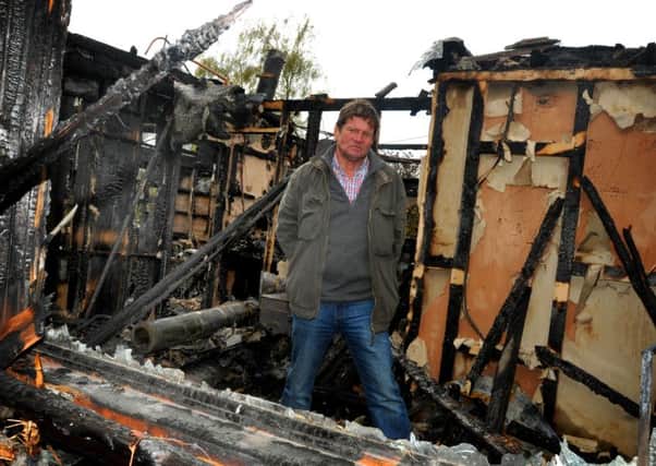 BLACKPOOL  26-04-16
John Tootill outside his home which has been destroyed after a fire, thought to have started in the roof, at Maple Farm Nursery Gardens, Westby.
