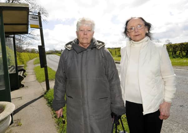Rennie Fry is concerned over proposed cuts to the bus service in Over Wyre.  She is pictured with fellow resident and service user Beryl Winton (left)