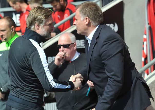 Fleetwood Town's manager Steven Pressley and Blackpool's manager Neil McDonald
