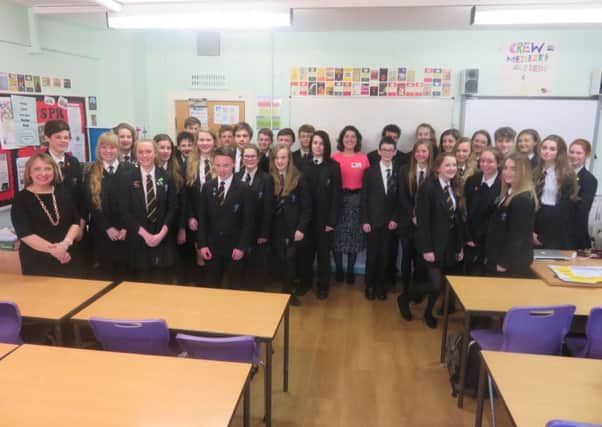 Dr Katharine Earnshaw with pupils and staff from the college