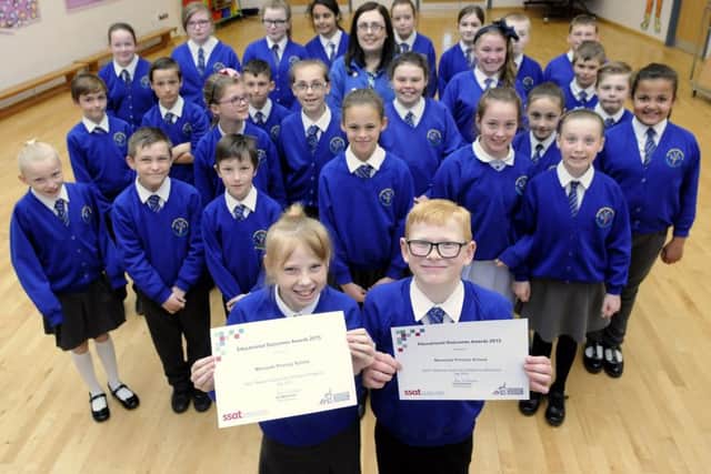 Year 6 pupils at Mereside Primary School celebrate after being ranked in the top 20% of schools nationally for reading, writing and maths by the SSAT.