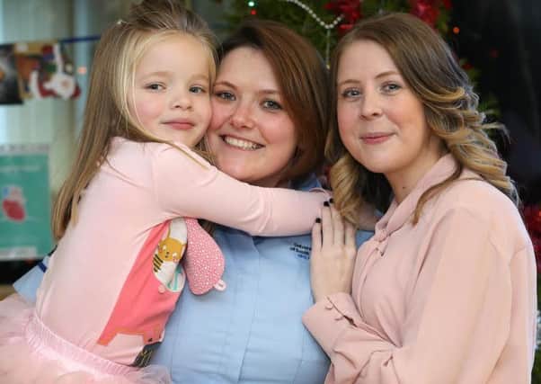 Rosie's godaughter Fiorella, transplant nurse Lisa MacDonald & Rosie Neath