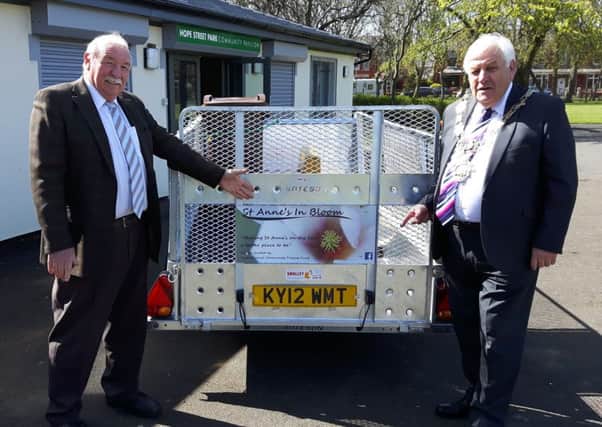 Former Fylde mayor Coun Peter Hardy presents a new trailer to St Annes In Bloom treasurer Coun Tony Ford