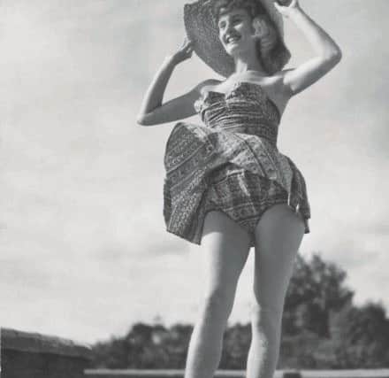Pat Stewart, wearing her outlandish rafia shoes in shot at Blackpool in 1950