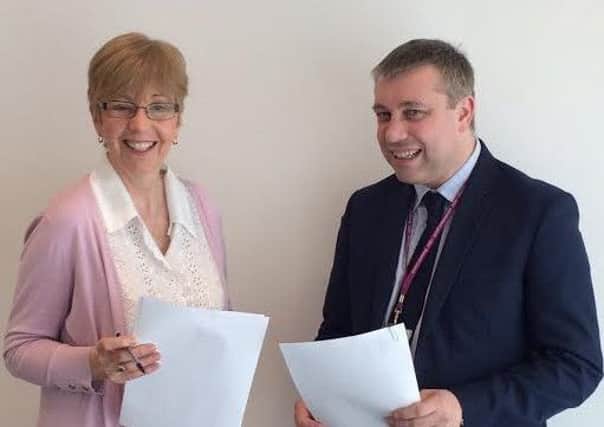 Coun Mark Smith meets Frances Thorpe of new business Welcome Deaf Awareness