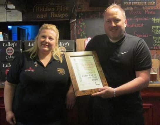 CAMRA Cider Pubs Officer Vanessa Gledhill  presenting award to landlord Andy Daubney 2016