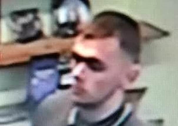 Police want to speak to this man after a 24-year-old woman had a cigarette stubbed out in her eye