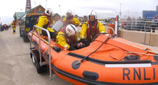 The RNLI rescue a man from the water