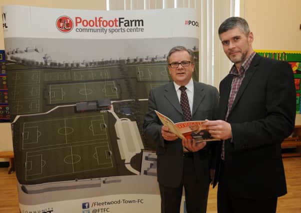 NPL Estates Site Director Hillhouse Scott Carswell (left) and Fleetwood Town Chief Executive Steve Curwood in front of a display of the new Poolfoot Farm development plans.