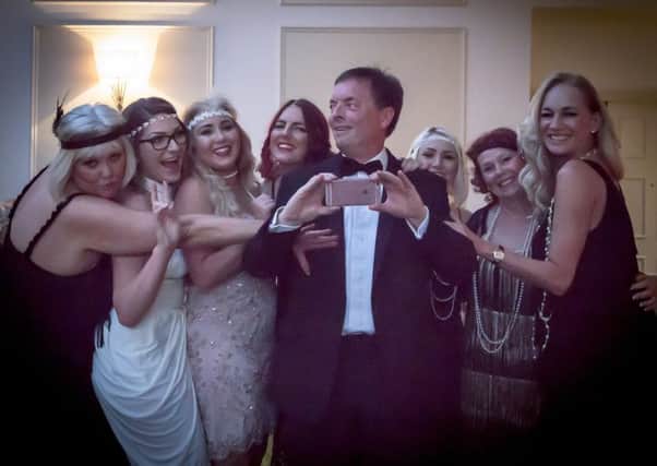 Gatsby Ball organised by the Friends of Lytham Hall. Richard Edge from event sponsors Mercedes with a bevy of beauties
