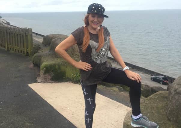 Rose-Marie keeps in shape for gruelling tour by power walking on the Prom